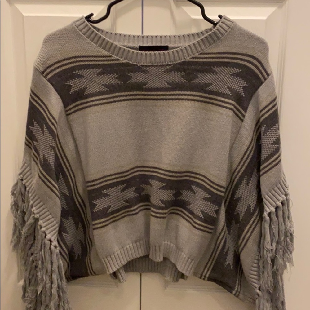 Material Girl open fringe sleeved sweater poncho